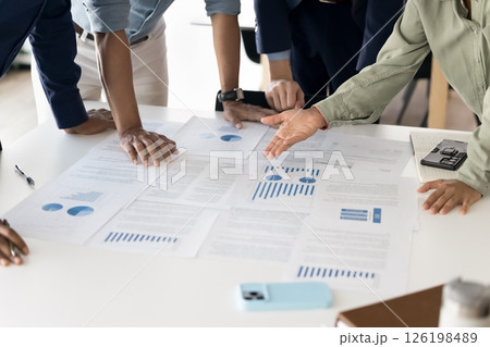 Employees analyzing sales result, do marketing research, closeup 126198489