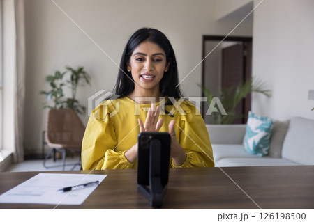 Confident young woman talk via videocall using sign language gestures 126198500