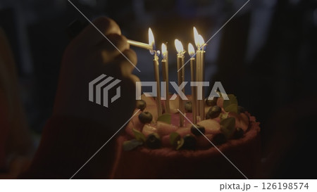 Celebrating Life with a Beautiful Birthday Cake Adorned with Colorful Candles and Joyful Moments. Stock Footage 126198574