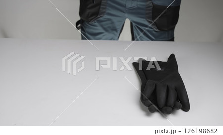 The video shows a person preparing safety gear, emphasizing precautions. Creative The video shows a person preparing safety gear, emphasizing precautions. Creative 126198682