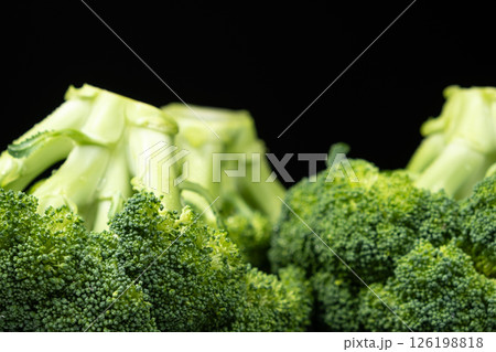 Close-Up View of Fresh Green Broccoli with Detailed Texture. 126198818