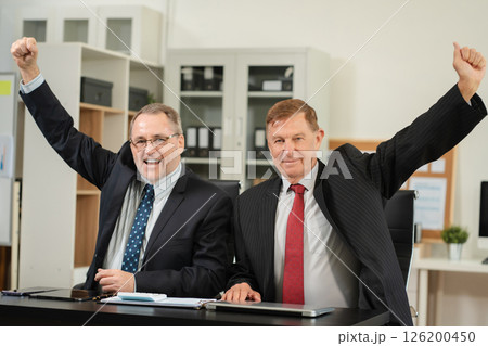 Successful confident mature businessman leader looking at camera in office. Successful confident mature businessman leader looking at camera in office. 126200450