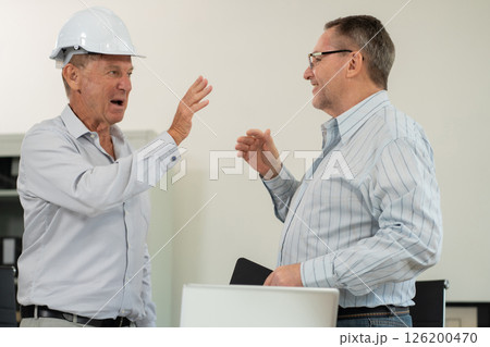 Architect team and Colleagues caucasian, join hands to join forces to join forces to work for the industry for success. Teamwork and professional colleagues : Workers' hands, teamwork concept 126200470
