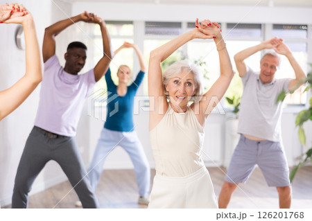 Group of multiethnic mature people dancing modern dance 126201768
