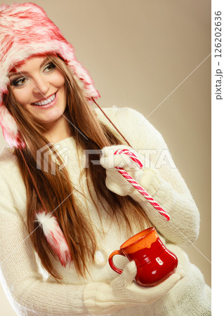 Girl with cane in xmas mug. 126202636