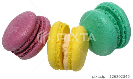 Macarons with a creamy white filling, isolated background. The macaron has a smooth, porous shell 126202846