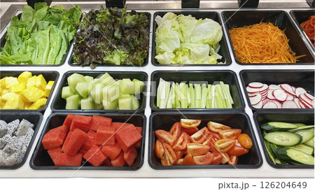 Fresh Vegetable and Fruit Salad Bar Display also included melon, watermelon, tomatoes, celery, beetroot, cabbage, pineapple, dragon fruit, carrot, cucumber Fresh Vegetable and Fruit Salad Bar Display also included melon, watermelon, tomatoes, celery, beetroot, cabbage, pineapple, dragon fruit, carrot, cucumber 126204649