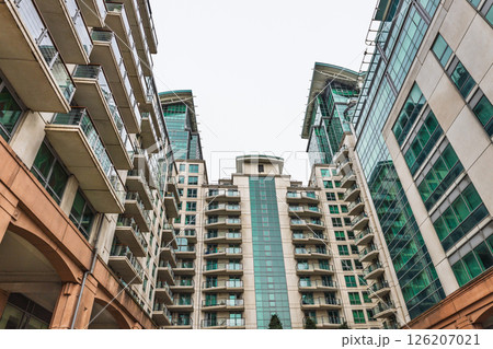 Modern Residential High Rise Buildings with Balconies and Glass Facades in Urban Area 126207021