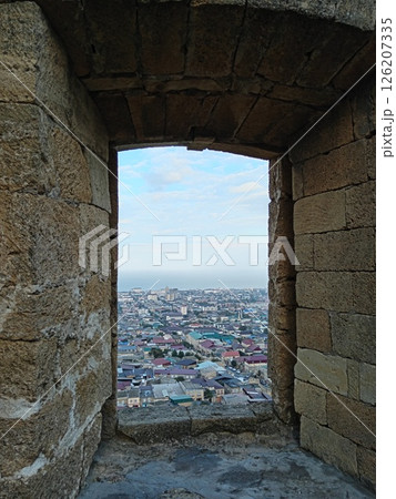 Aerial view of ancient Derbent from Naryn-Kala fortress window, Dagestan, Russia, Cloudy summer weather 126207335