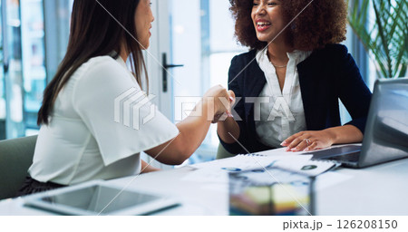 Business women, smile and handshake in office for merger, partnership or acquisition. Agreement, team and shaking hands with company buyer for deal, equity purchase and integration with joint venture Business women, smile and handshake in office for merger, partnership or acquisition. Agreement, team and shaking hands with company buyer for deal, equity purchase and integration with joint venture 126208150