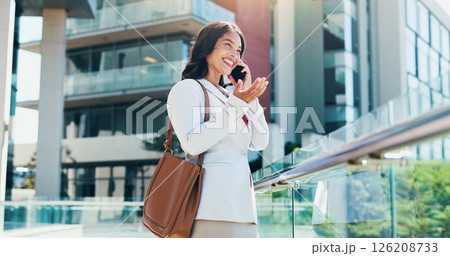 Happy woman, business or realtor with phone call in city for conversation, chat or discussion. Female person, employee or real estate agent with smile on mobile smartphone for property or negotiation 126208733