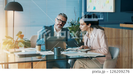 Paperwork, laptop and business people in office with discussion for company investment deal. Computer, documents and finance manager with investor client for meeting with dividend report in workplace Paperwork, laptop and business people in office with discussion for company investment deal. Computer, documents and finance manager with investor client for meeting with dividend report in workplace 126209276