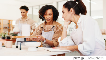 Pottery, class and people with vase in studio for teaching, learning and practice skills. Creative course, workshop and women with ceramic mold for design, sculpture and DIY hobby in art lesson 126209293