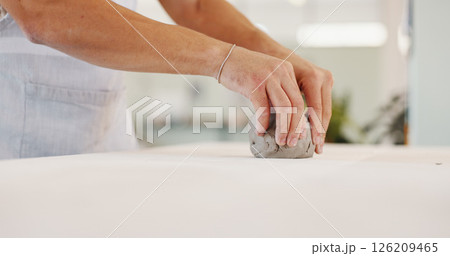 Pottery, art and hands of person in workshop with clay for design, sculpture and learning skills in studio. Creative, designer and artist with ceramic object for DIY hobby, craft and handmade product Pottery, art and hands of person in workshop with clay for design, sculpture and learning skills in studio. Creative, designer and artist with ceramic object for DIY hobby, craft and handmade product 126209465