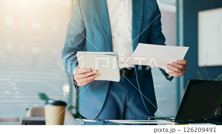 Hands, man and tablet with document in office for comparison, budget review and financial report. Male person, digital and paperwork of schedule update, accounting information and investment proposal Hands, man and tablet with document in office for comparison, budget review and financial report. Male person, digital and paperwork of schedule update, accounting information and investment proposal 126209491