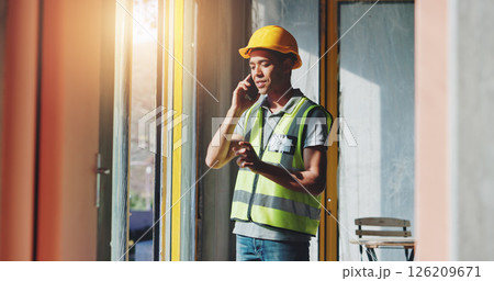 Man, phone call and discussion at construction site for renovation by window, insight or negotiation for material price. Person, architecture and smartphone for talk, property or development project Man, phone call and discussion at construction site for renovation by window, insight or negotiation for material price. Person, architecture and smartphone for talk, property or development project 126209671
