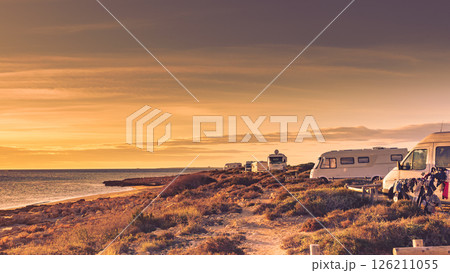 Camper cars on beach sea shore 126211055