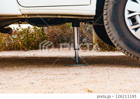 Camper leveling support leg in use. Camper leveling support leg in use. 126211195