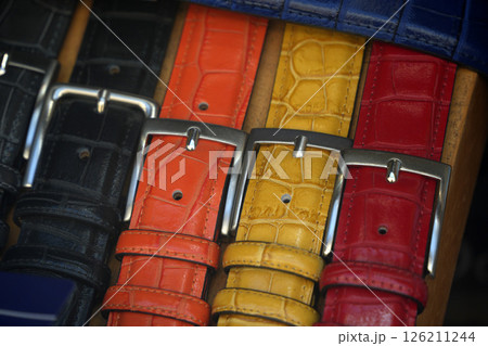 Colorful leather belt in a shop window, italian fashion luxury Colorful leather belt in a shop window, italian fashion luxury 126211244