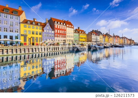 Copenhagen, Denmark. Vibrant harbor of Nyhavn, colorful buildings and boats. 126211573
