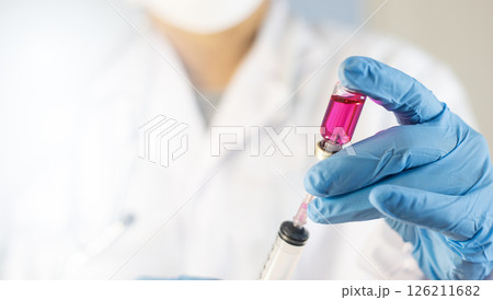 Doctor preparing vaccine, health insurance concept, health care, medicine, health and access to welfare, health concept 126211682