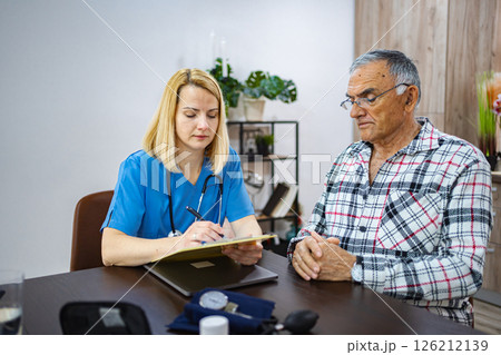 Health consultation between doctor and patient in clinic Health consultation between doctor and patient in clinic 126212139
