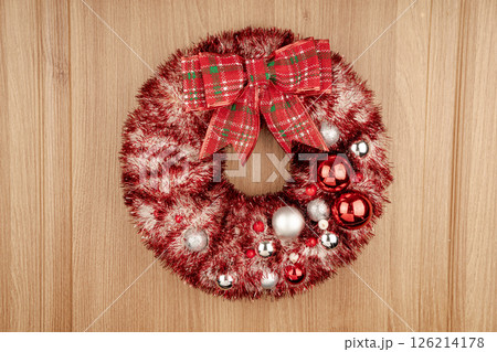 Christmas wreath with golden bells and fir branches. Christmas wreath with golden bells and fir branches. 126214178