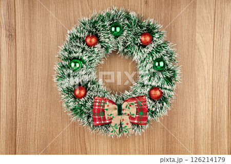 Elegant wreath with snowflakes and silver balls. Elegant wreath with snowflakes and silver balls. 126214179