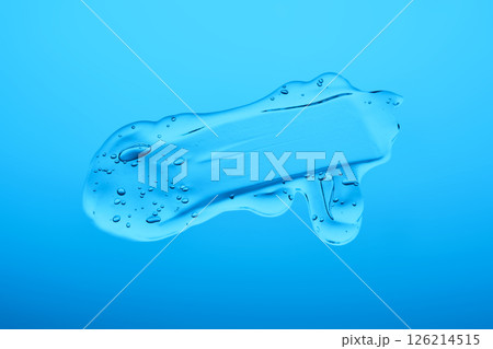 The texture of a cosmetic gel on a blue background. 126214515