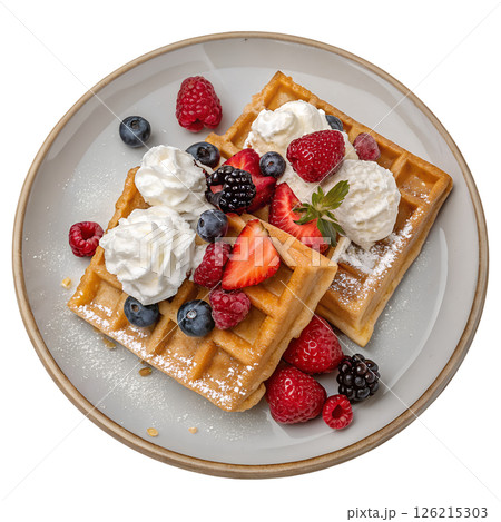 Delicious golden waffles topped with fresh mixed berries and whipped cream, sweet breakfast Delicious golden waffles topped with fresh mixed berries and whipped cream, sweet breakfast 126215303