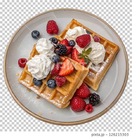 Delicious golden waffles topped with fresh mixed berries and whipped cream, sweet breakfast 126215303