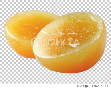 Two halves of a translucent, ambercolored sphere reveal a captivating internal structure.  The cracked surface suggests fragility, yet the vibrant color hints at sweetness and warmth. 126215853