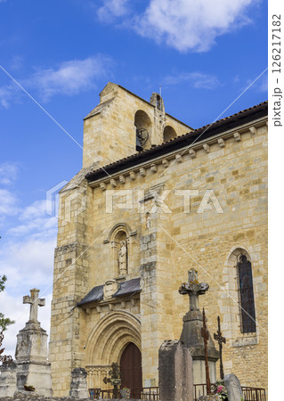 Saint Pierre Church rising above cemetery in La Sauve, France 126217182
