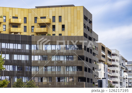 Modern architecture buildings with gold and wood cladding in Montpellier, France 126217195