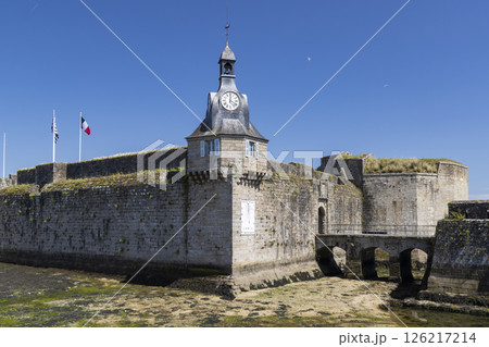 Ville Close, fortified city of Concarneau, showing ramparts, clock tower and drawbridge at low tide, Finistere, Brittany, France Ville Close, fortified city of Concarneau, showing ramparts, clock tower and drawbridge at low tide, Finistere, Brittany, France 126217214