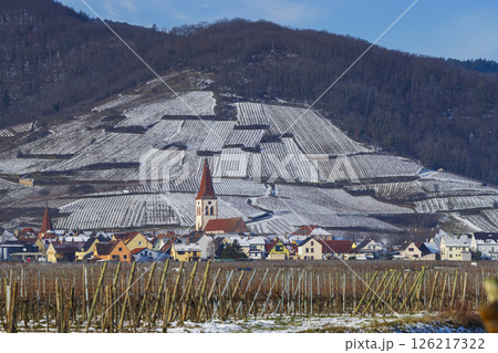 Kaysersberg vineyard and Ammerschwihr village covered by snow in Alsace, France, during winter Kaysersberg vineyard and Ammerschwihr village covered by snow in Alsace, France, during winter 126217322