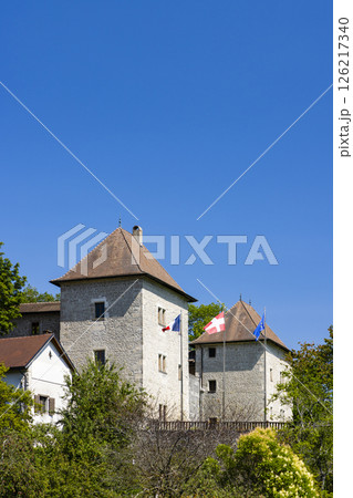 Chateau de Clermont showing french, Savoy and european flags in Auvergne Rhone Alpes, France Chateau de Clermont showing french, Savoy and european flags in Auvergne Rhone Alpes, France 126217340