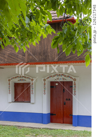 Traditional Czech Wine Cellar showcasing colorful floral decorations in Prusanky, Czechia Traditional Czech Wine Cellar showcasing colorful floral decorations in Prusanky, Czechia 126217348