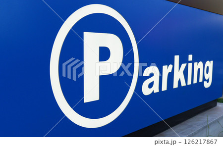 Parking sign clearly guides drivers to spots Parking sign clearly guides drivers to spots 126217867