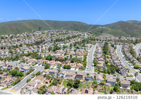 Aerial view of San Marcos neighborhood, with houses and street. South California 126219310