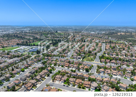 Aerial view of San Marcos neighborhood, with houses and street. South California 126219313