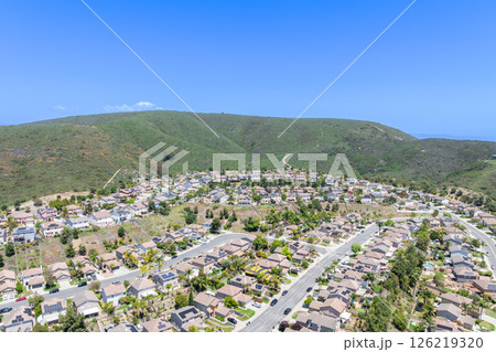 Aerial view of San Marcos neighborhood, with houses and street. South California 126219320