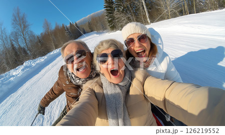 Happy old people taking selfie in the snow 126219552