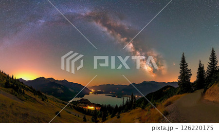 Stunning panorama of the Milky Way over a serene mountain lake at night 126220175