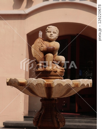 An elegant Artisan Fountain Sculpture that blends art with a water feature for outdoor spaces An elegant Artisan Fountain Sculpture that blends art with a water feature for outdoor spaces 126220678