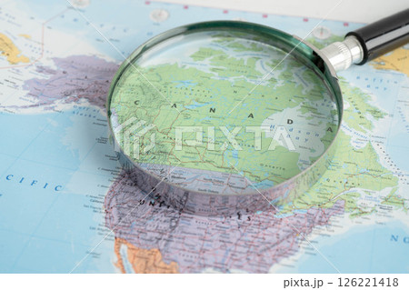 Bangkok, Thailand December 10, 2023 Canada map in world map paper. Bangkok, Thailand December 10, 2023 Canada map in world map paper. 126221418