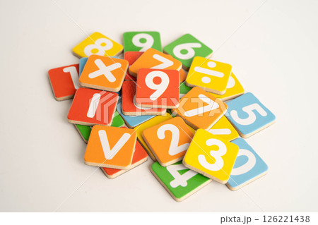 Number wood block cubes for learning Mathematic, education math concept. 126221438