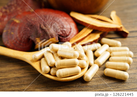 Lingzhi or Reishi mushroom with capsules, organic natural healthy food. 126221445