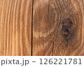 Tree knot texture with golden wood tones 126221781