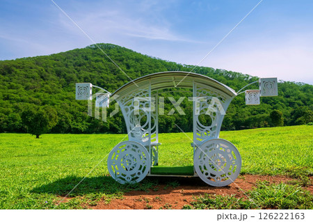 Vintage white horse car chair by beautiful heart shape tree Vintage white horse car chair by beautiful heart shape tree 126222163